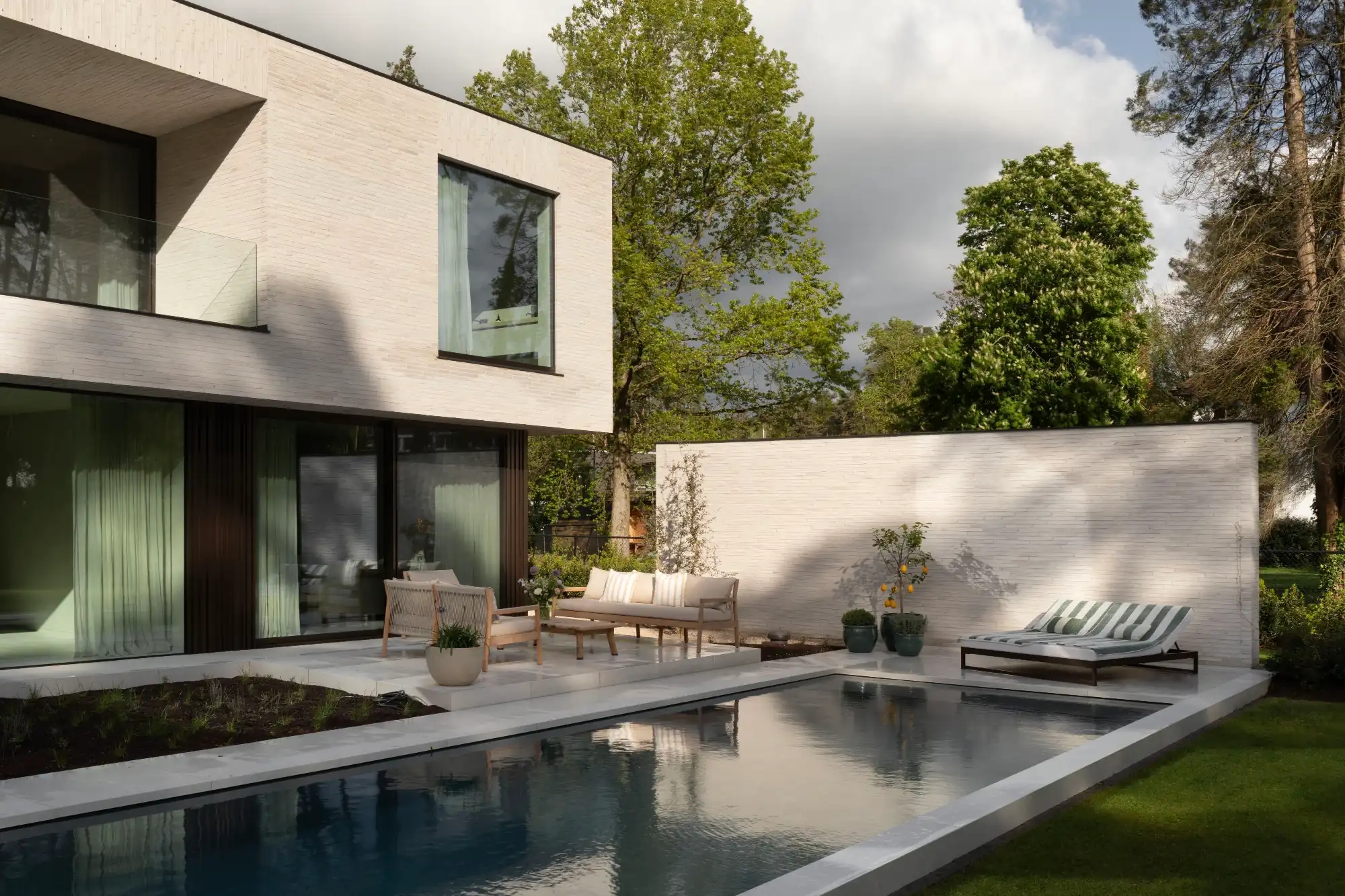 modern villa with pool and sunshine